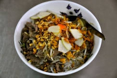 Bun Bo: beef, noodles, mint, basil, fried onions, carrot, pickled radish, bean sprouts, lettuce, peanuts